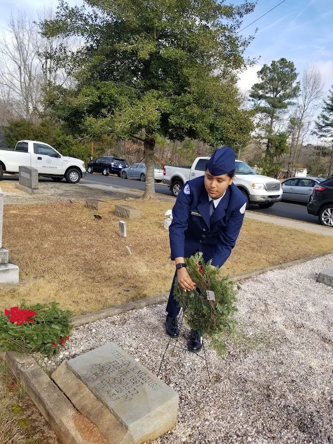 Cadet lays a wreath for Wreaths Across America