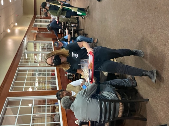 Cadet bussing at Veteran's Day Golden Corral meal